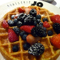 Belgian waffle with fresh berries at Braserrie Jo restaurant in Boston Belgian waffle with fresh berries at Braserrie Jo restaurant in Boston