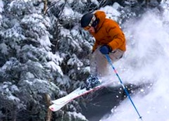 Cannon Mountain Ski Area - New England Ski Area near Boston Photo of skier at Wildcat Mountain, New England ski area in New Hampshire