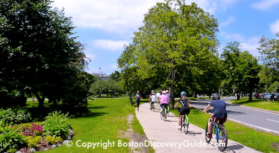 Bike riders in Boston's Fenway neighborhood, near the famous Victory Gardens Bike riders in Boston's Fenway neighborhood, near the famous Victory Gardens