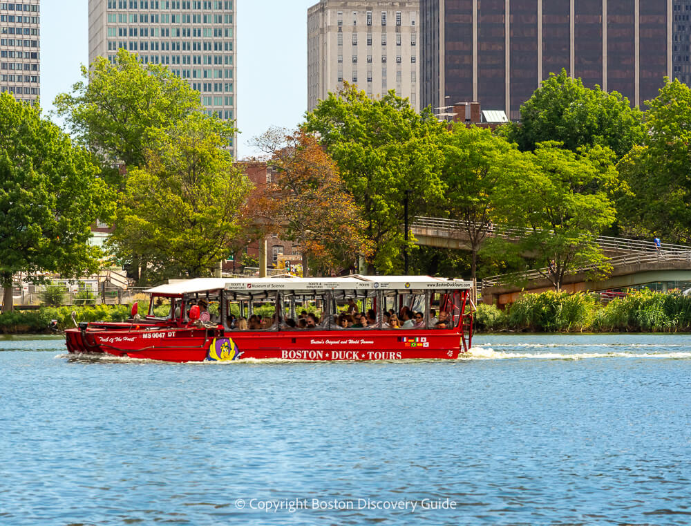 This Duck Tour is driving past stately Victorian-era brownstones in Boston's Back Bay neighborhood