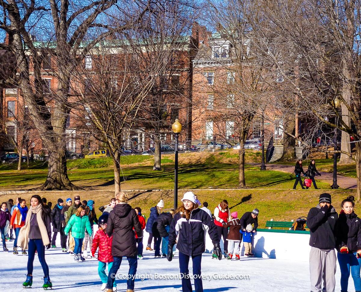 Boston Common's Frog Pond ice rink with Beacon Hill in the background