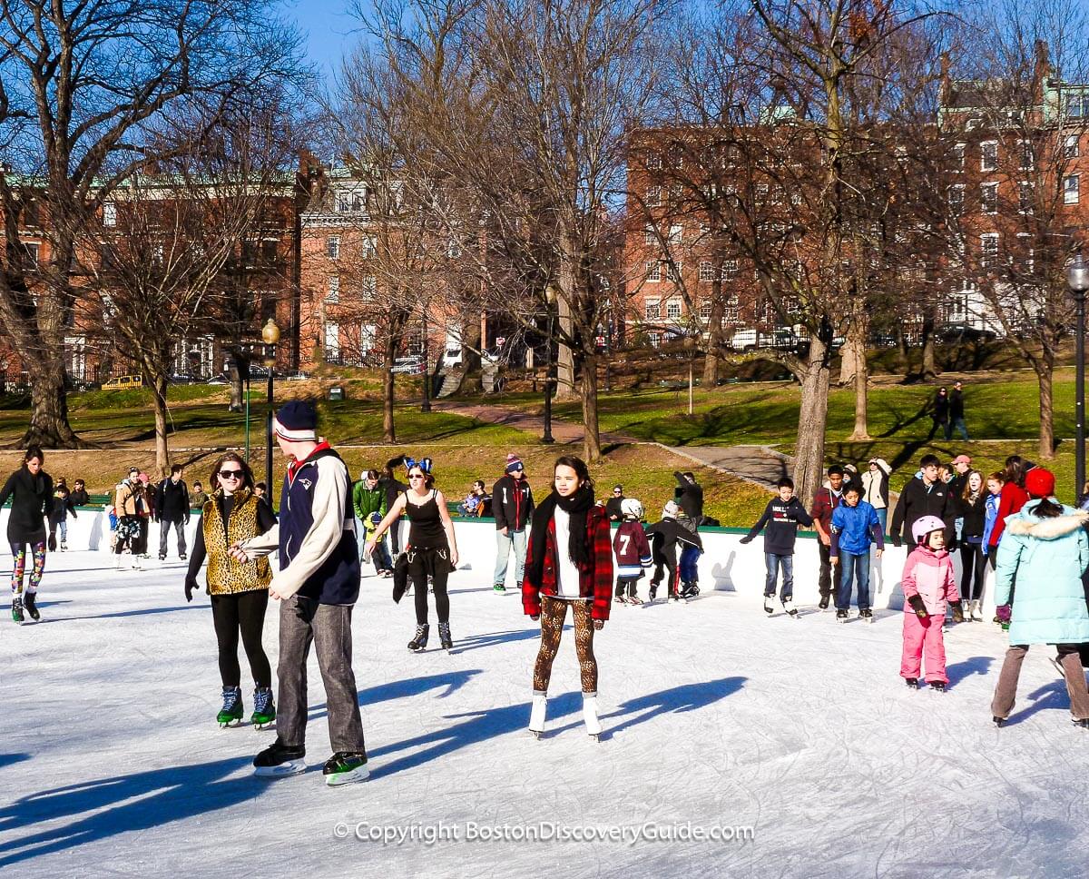 Boston Common's Frog Pond ice rink with Beacon Hill in the background