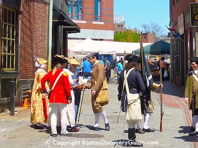 Costumed reenactors in historic Downtown Boston