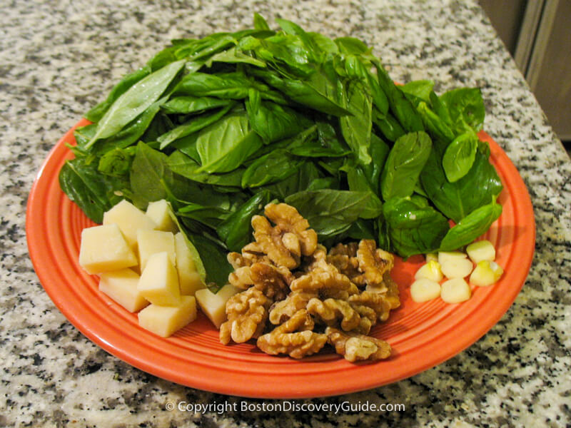 Prepped ingredients for basil pesto Prepped ingredients for basil pesto
