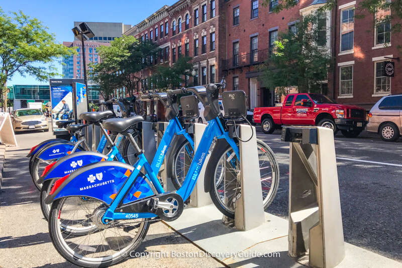 Rack of Blue Bikes on Charles Street in Beacon Hill