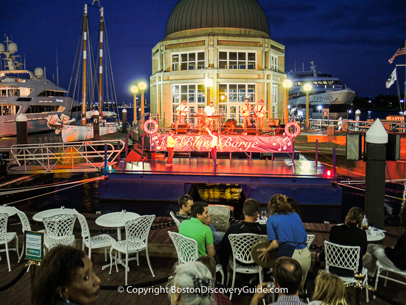 Summer evening at Boston Harbor Hotel with a concert at the Blues Barge