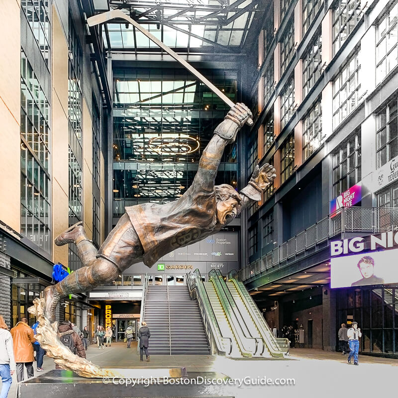 Statue of defenceman Bobby Orr flying through the air after making the winning goal in overtime to clich the 1970 Stanley Cup for the Bruins - You can see the statue at Hub on Causeway next to North Station/TD Garden