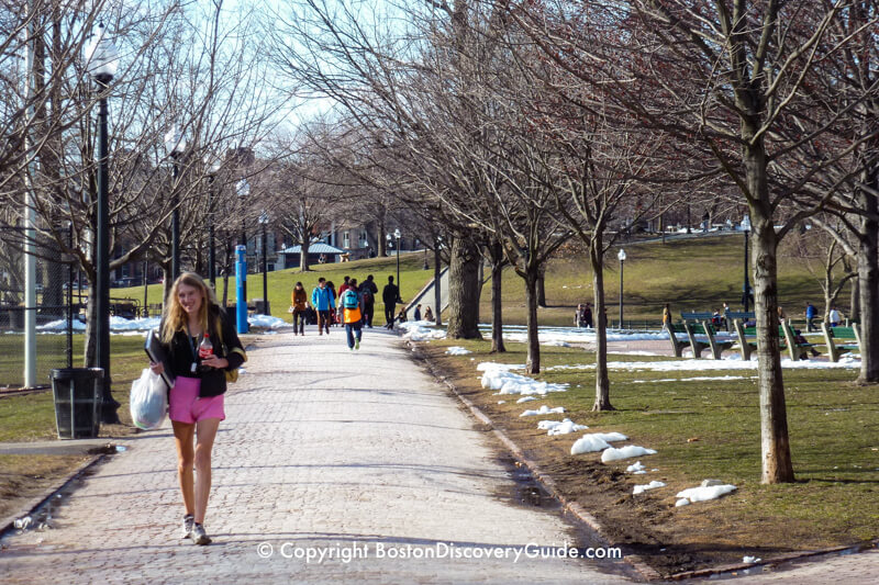 Yes, there's snow on the ground on Boston Common in late March - but the weather is warm enough to wear shorts Avenue in Back Bay, near the Public Garden, in February Yes, there's snow on the ground on Boston Common in late March - but the weather is warm enough to wear shorts