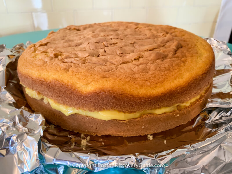 Assembled Boston cream pie ready to be glazed