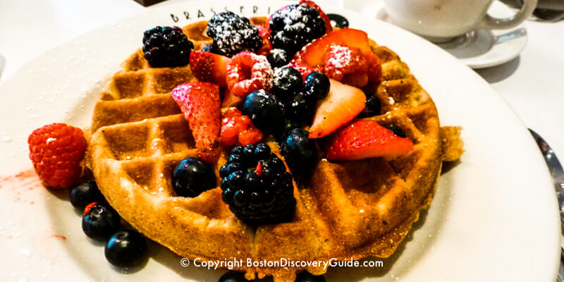 Belgian waffle with fresh berries at Braserrie Jo restaurant in Boston Belgian waffle with fresh berries at Braserrie Jo restaurant in Boston