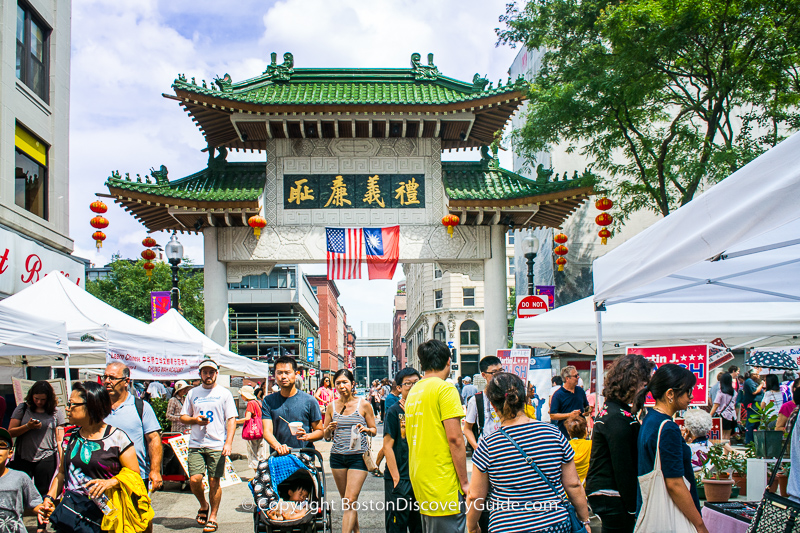 Vendors and visitors during a previous August Moon Festival in Boston's Chinatown 