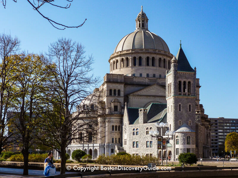 Christian Science building in late March - no leaves yet on most trees, but others are turning slightly green from leaf buds