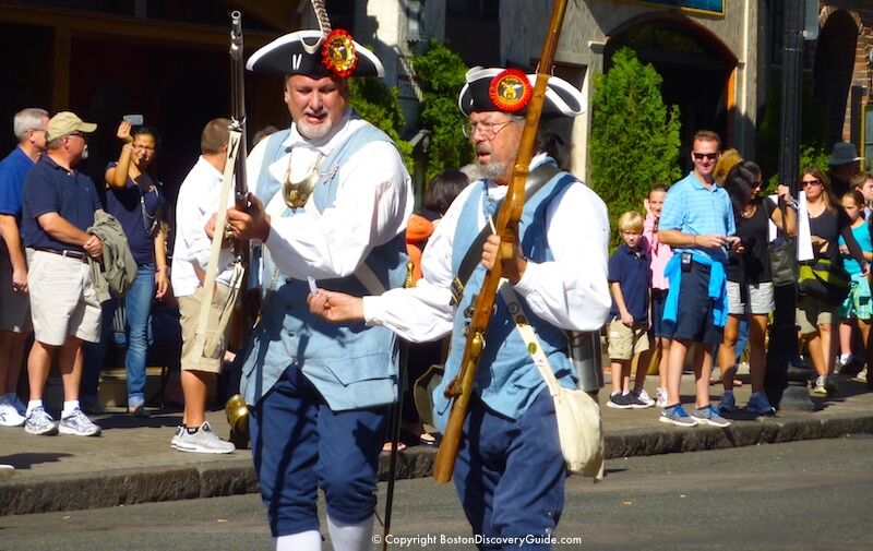 Colonial militia reenactors in Boston Columbus Day Parade Colonial militia reenactors in Boston Columbus Day Parade