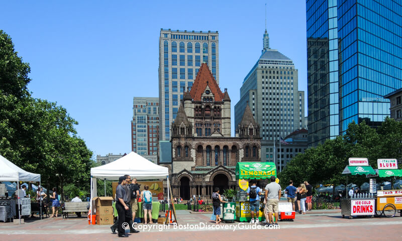 Copley Square Weekly Farmer's Market - Trinity Church in the background and Hancock Tower on the right Copley Square Weekly Farmer's Market - Trinity Church in the background and Hancock Tower on the right