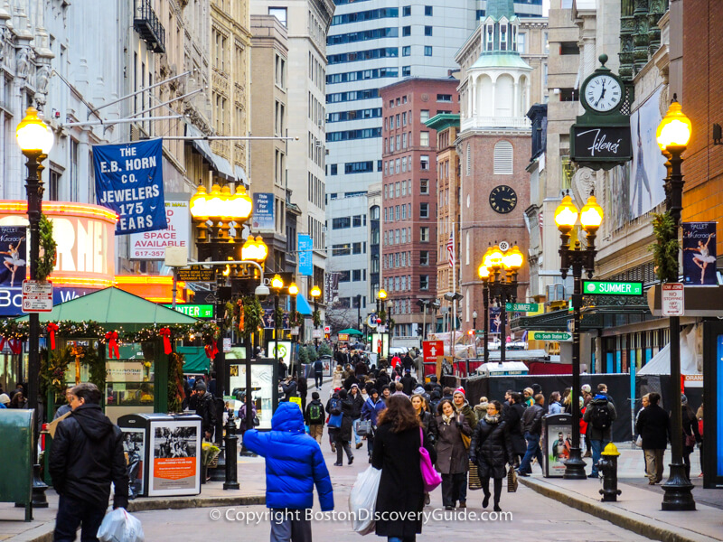 Boston neighborhoods: Downtown Crossing shoppers, with Old South Meeting House in the background Boston neighborhoods: Downtown Crossing shoppers, with Old South Meeting House in the background