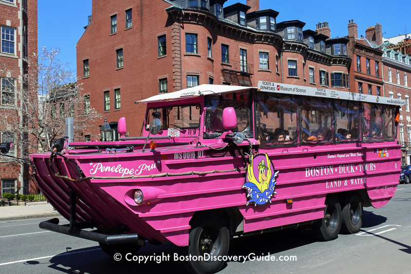 This Duck Tour is driving past stately Victorian-era brownstones in Boston's Back Bay neighborhood