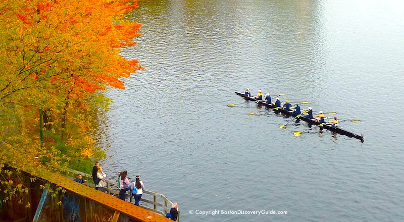 Spectators watch the Head of the Charles from the ramp up to the Boston University Bridge