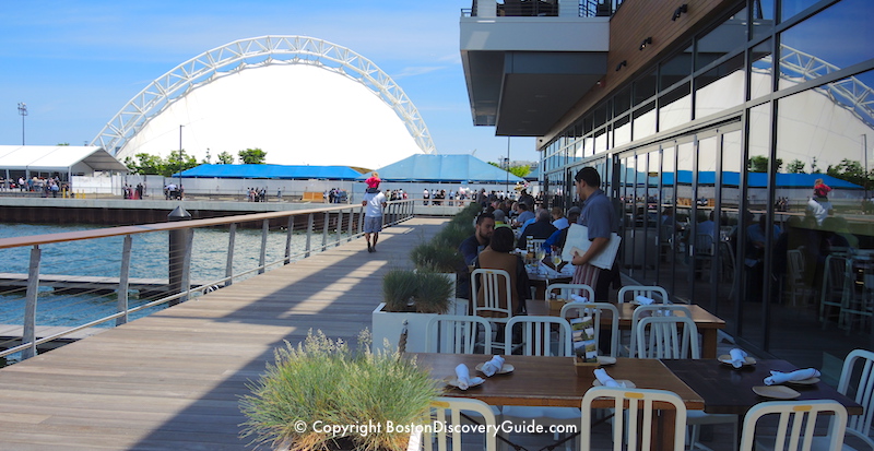 Tables overlooking Boston Harbor at Legal Harborside