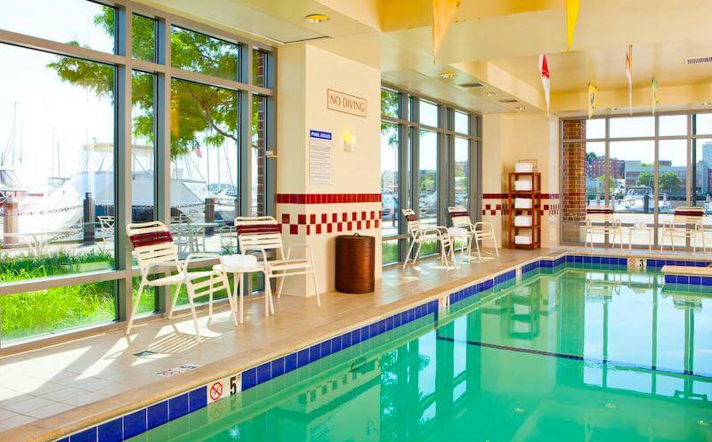 Indoor swimming pool overlooking the boat yard and harbor