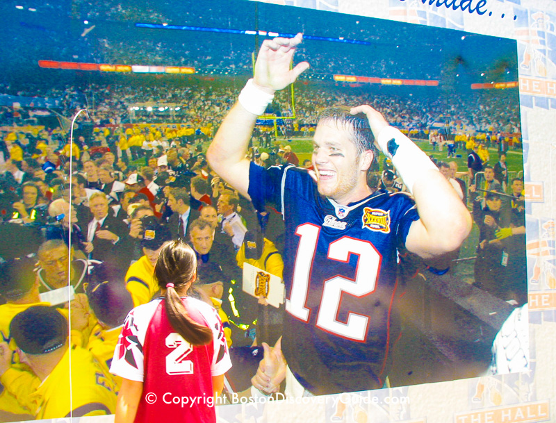 Giant wall mural showing Tom Brady at Patriot Place, next to Gillette Stadium Giant wall mural showing Tom Brady at Patriot Place, next to Gillette Stadium