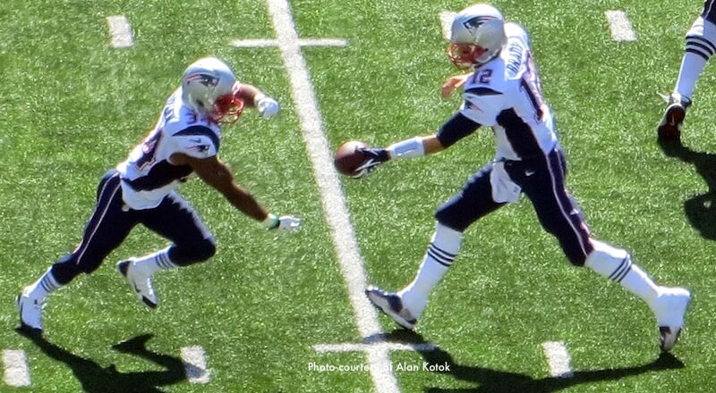 Tom Brady handing off ball