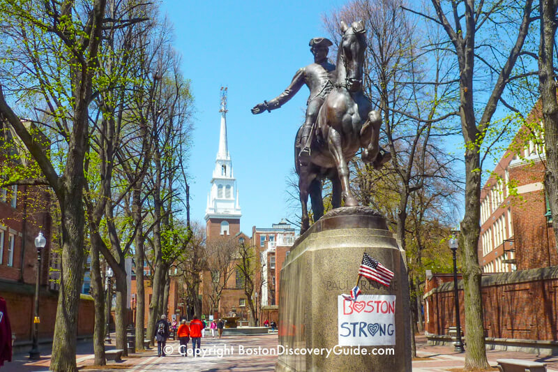 Paul Revere Statue in Boston's North End, with Old North Church in the background Paul Revere Statue in Boston's North End, with Old North Church in the background