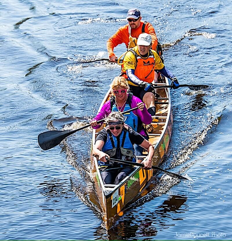 Canoe team competing in the Run of the Charles race in Boston - Photo courtesy of Charles River Watershed Association & Jamie Doucett Photo
