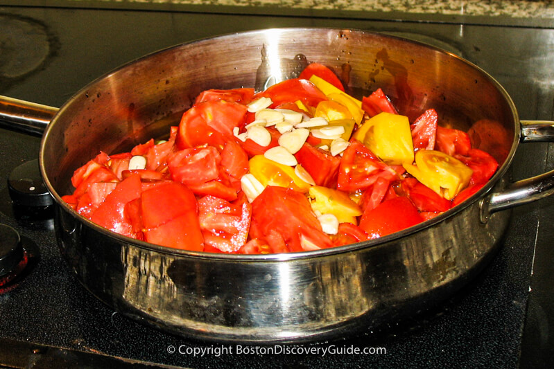 Tomatoes and garlic in our 3-quart aluminum saute pan Tomatoes and garlic in our 3-quart aluminum saute pan