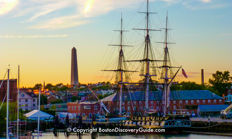 USS Constitution with Bunker Hill Monument in the background USS Constitution with Bunker Hill Monument in the background