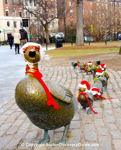 Make Way for Ducklings statues dressed in holiday attire