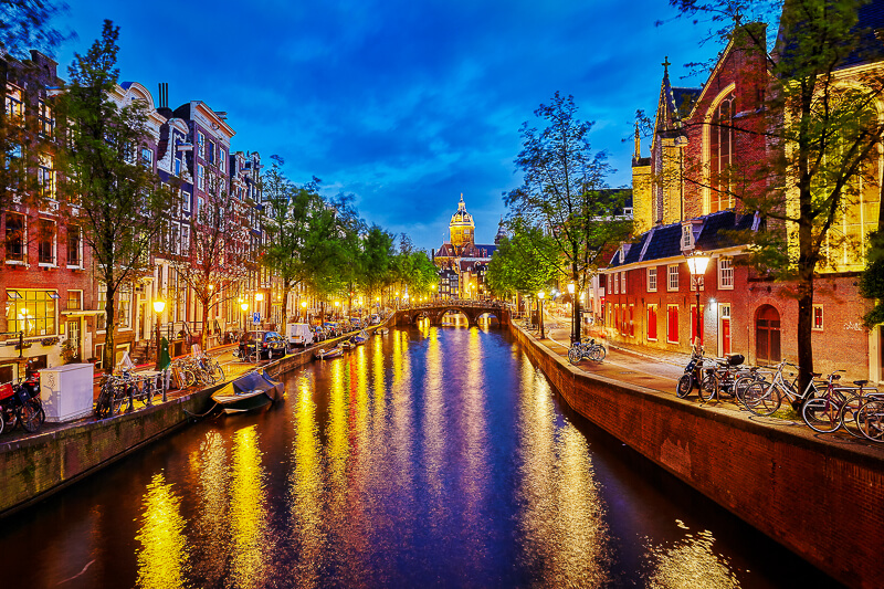 Canal in Amsterdam, The Netherlands - Photo courtesy of iStock/VitalyEdush