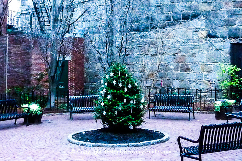 Temple Street Park in December - The gray granite wall is the back of St. John the Evangelist Church