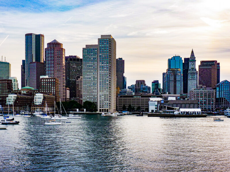 Boston skyline seen from Boston Harbor cruise on a hazy afternoon