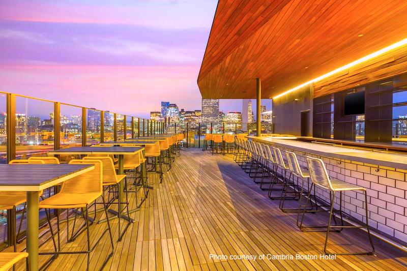 Rooftop deck overlooking the Boston skyline at Cambria Hotel