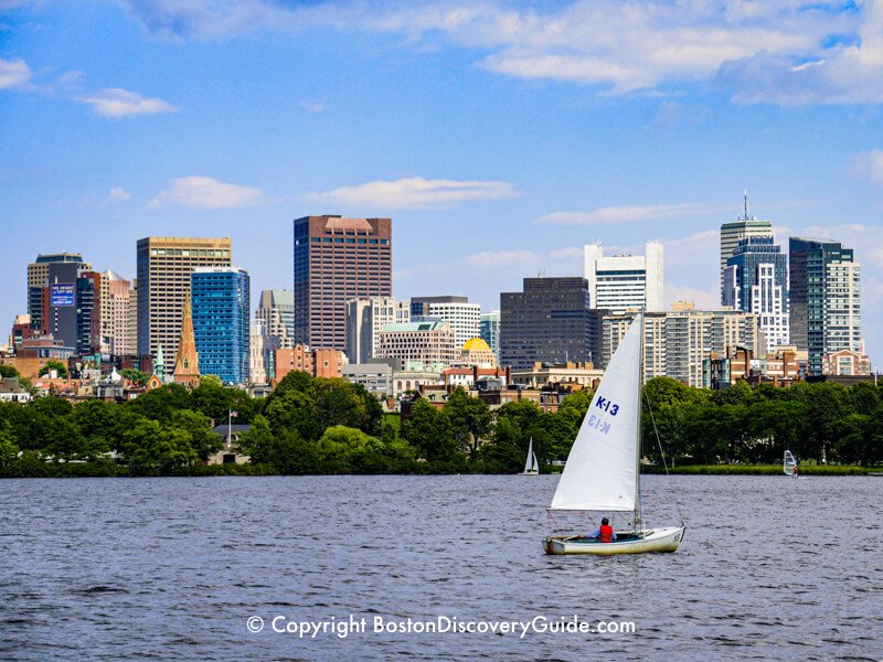 View of Charles River, Cambridge (on left) and Boston skyline (on right) during a Charles Riverboat sightseeing cruise