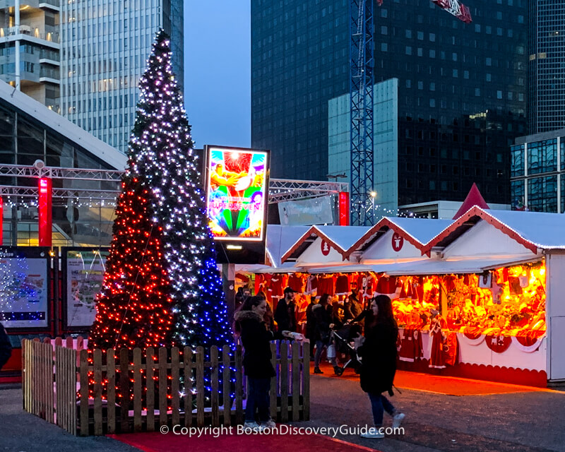 Christmas Trees and artisan chalets at the Holiday Market in Boston's Seaport