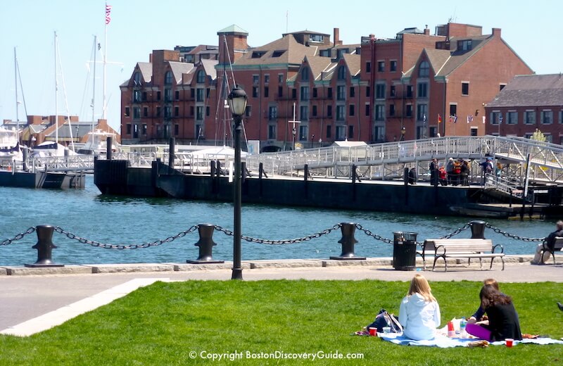 An April picnic in Christopher Columbus Park overlooking Boston Harbor, on a sunny day in late April