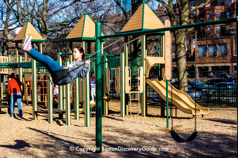 Stoneman Playground on the Esplanade, with Back Bay brownstones on the other side of Storrow Drive