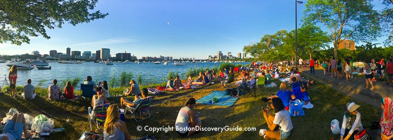 Waiting on the Boston bank of the Charles River to see the fireworks Waiting on the Boston bank of the Charles River to see the fireworks