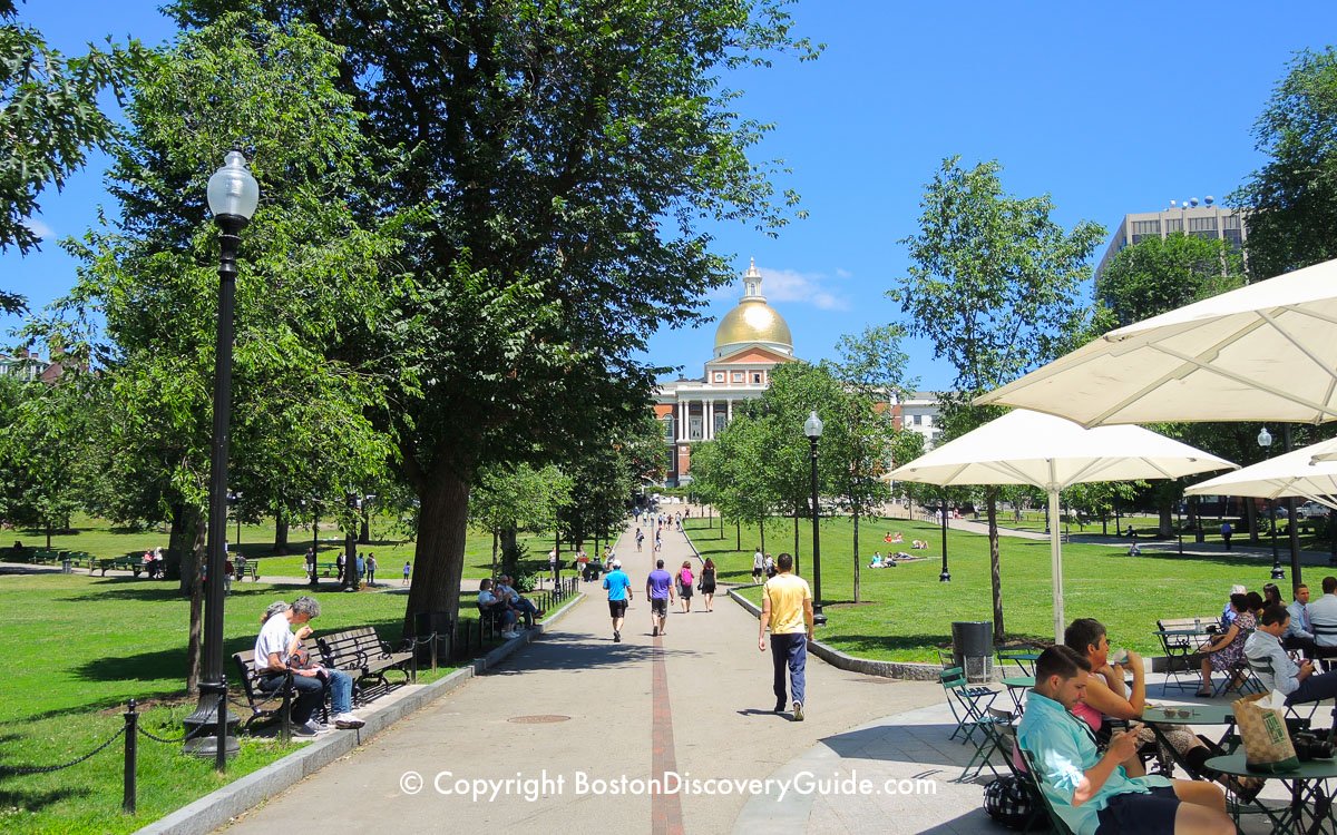 The red stripe of the Freedom Trail leading from Boston Common to the gold-domed Massachusetts State House in Beacon Hill