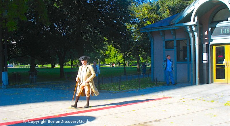 Costumed tour guide at the beginning of the Freedom Trail on Boston Common Costumed tour guide at the beginning of the Freedom Trail on Boston Common