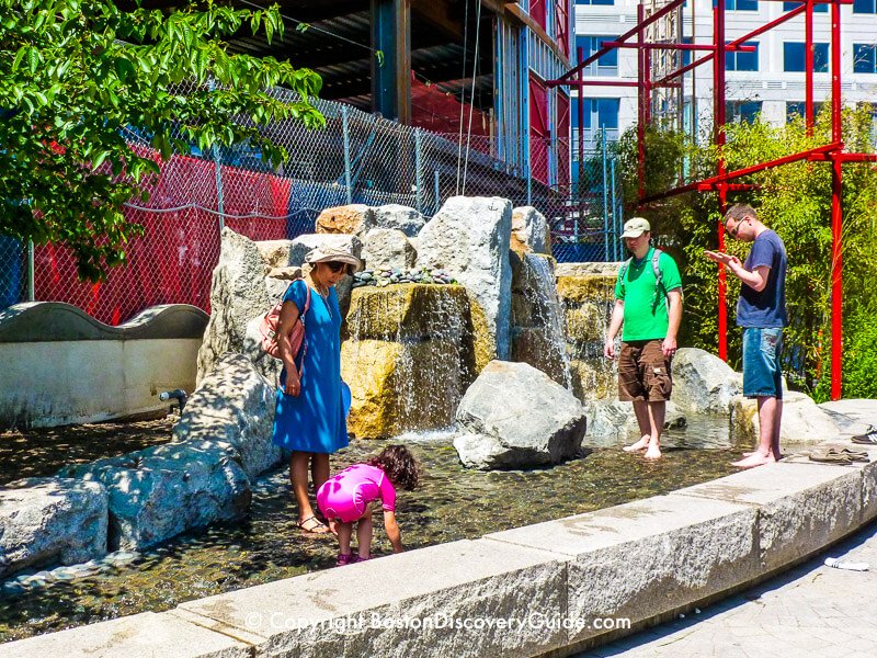 Stream with boulders and waterfalls provide another splash area for kids (and adults) in the Chinatown Park