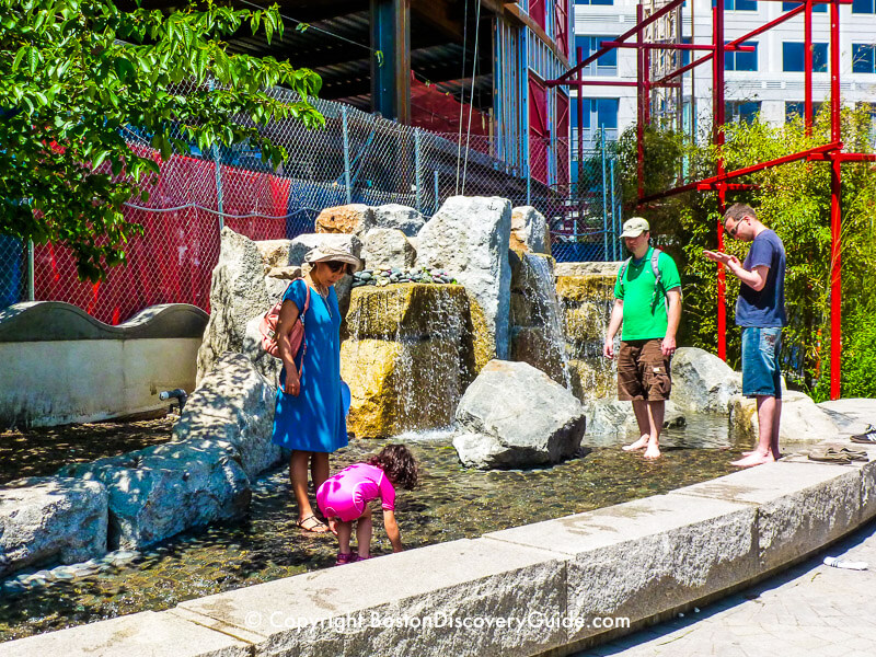 Stream with boulders and waterfalls provide another splash area for kids (and adults) in the Chinatown Park Stream with boulders and waterfalls provide another splash area for kids (and adults) in the Chinatown Park