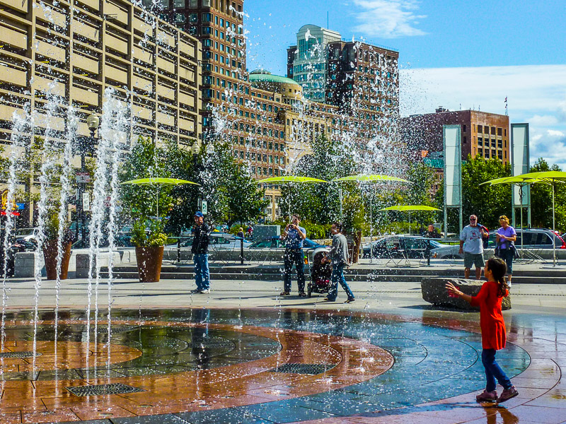 Splashing in Rings Fountain in the Wharf District Parks