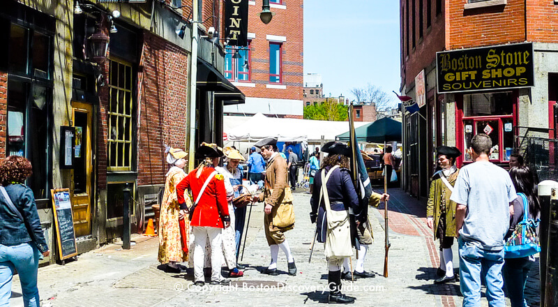 Costumed re-enactors on Marshall Street near The Point in Historic Downtown Boston Costumed re-enactors on Marshall Street near The Point in Historic Downtown Boston