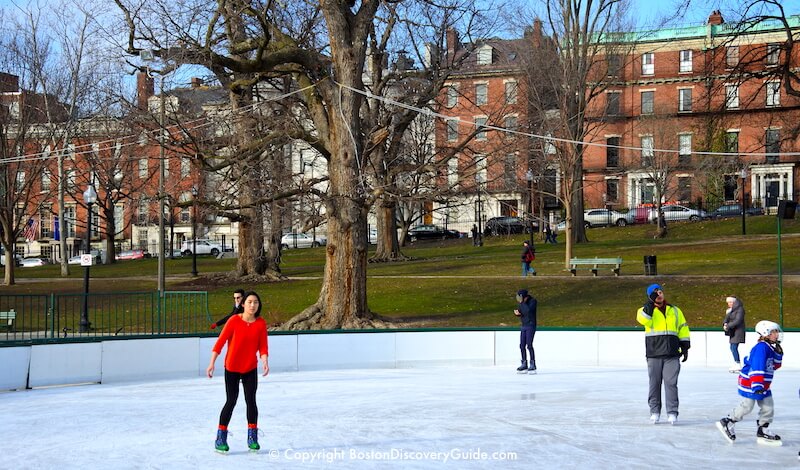Ice skating (wearing only a sweater) on Frog Pond at Boston Common on a sunny 50-degree day during mid-January