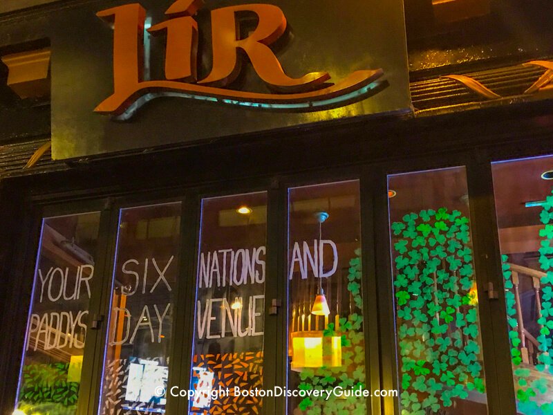 Green Dragon Tavern on Marshall Street in one of the oldest parts of Boston Lir's front window at night on Boylston Street