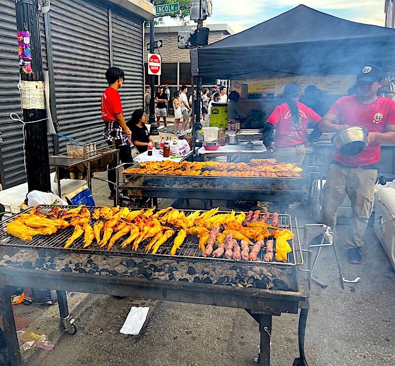 Seafood and meat roasting over hot coals at the Boston Little Saigon Night Market