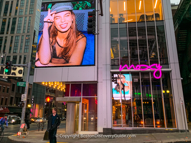 Moxy Hotel on the corner of Tremont and Boylston Streets, next to the Wilbur Theatre