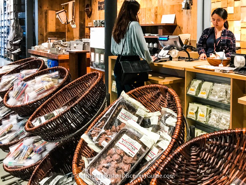 The packets of colored pens and Japanese candy near the cash registers at Muji can be hard to resist if you have to wait in line